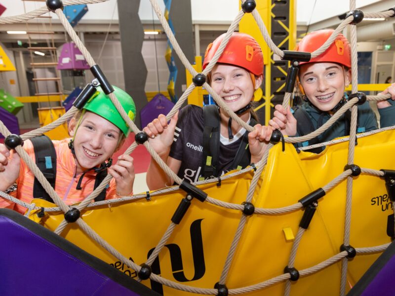 girls at Explorium looking through a net